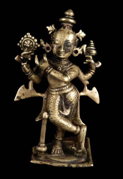 Statuette de Krishna jouant de la flûte