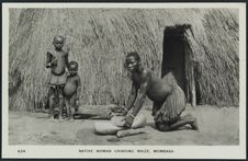 Native woman grinding maize, Mombasa