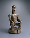 Statuette masculine assise