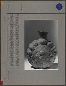 Vase en céramique rouge : sphère aplatie