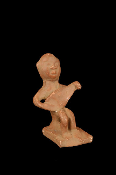 Figurine représentant un musicien