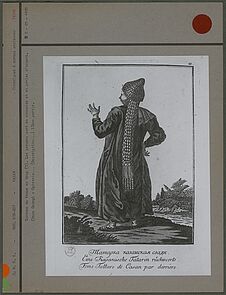 Costume de femme en drap avec parures en argent et monnaies